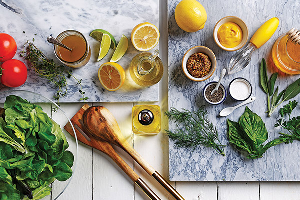 An assortment of nutritious ingredients for a specific recipe, featuring canola oil.